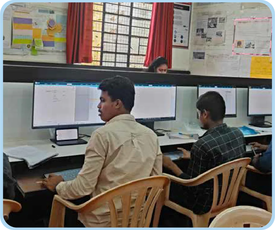 Students learning accounting and computer skills in a classroom as part of a Tally training program